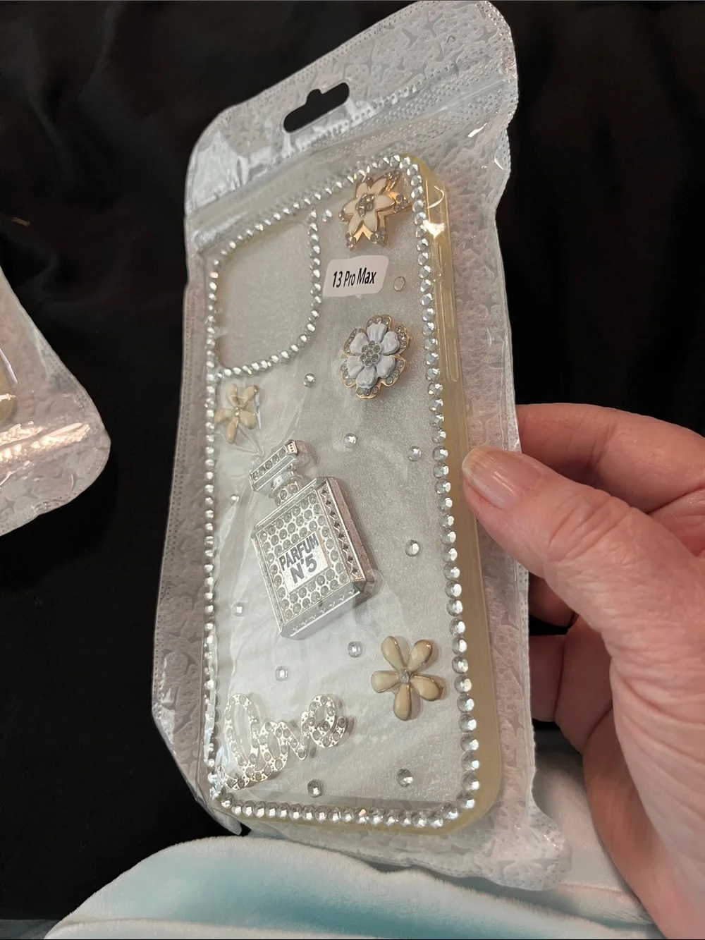 White Rhinestone Parfum Bottle Decorative Phone Case (13 Pro Max)